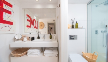 Resa Estates apartment for sale in Ibiza marina botafoch modern bedroom and shower.jpg